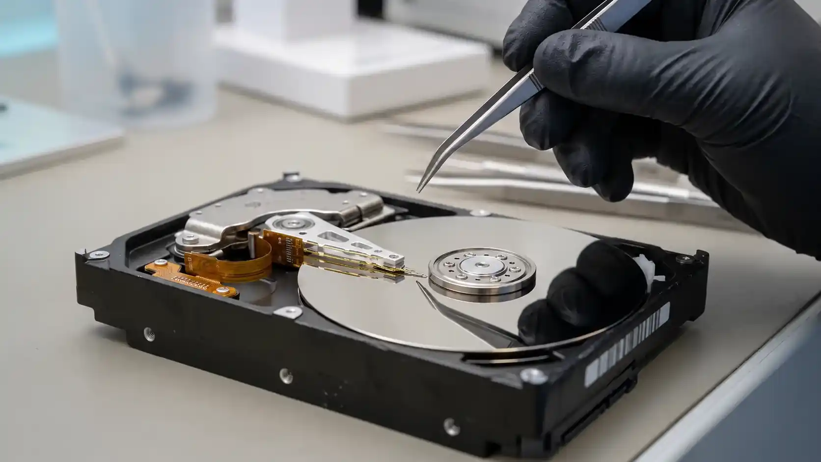 Hard drive head assembly being inspected after controlled head release