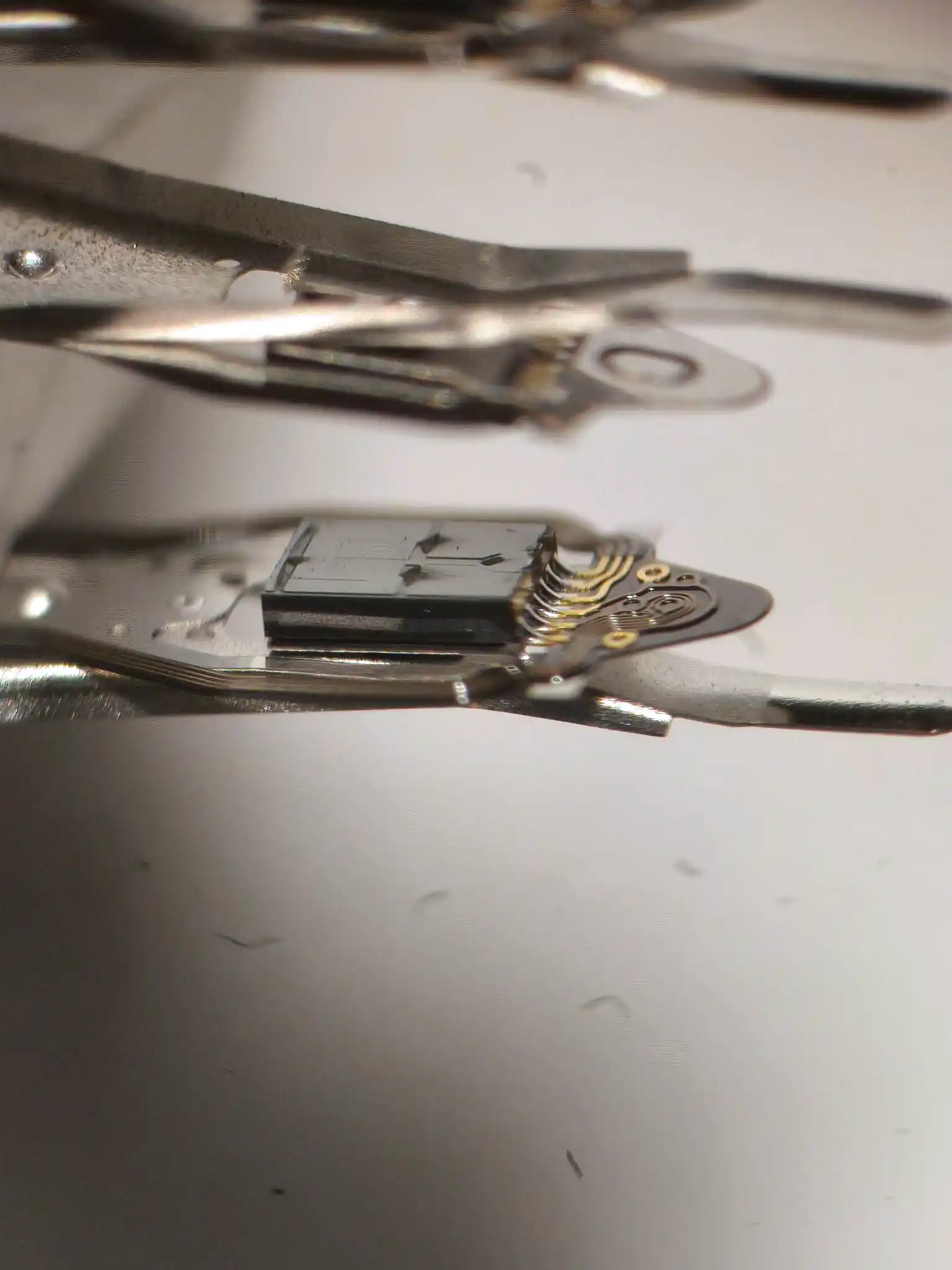 Close-up inspection of hard drive read-write heads