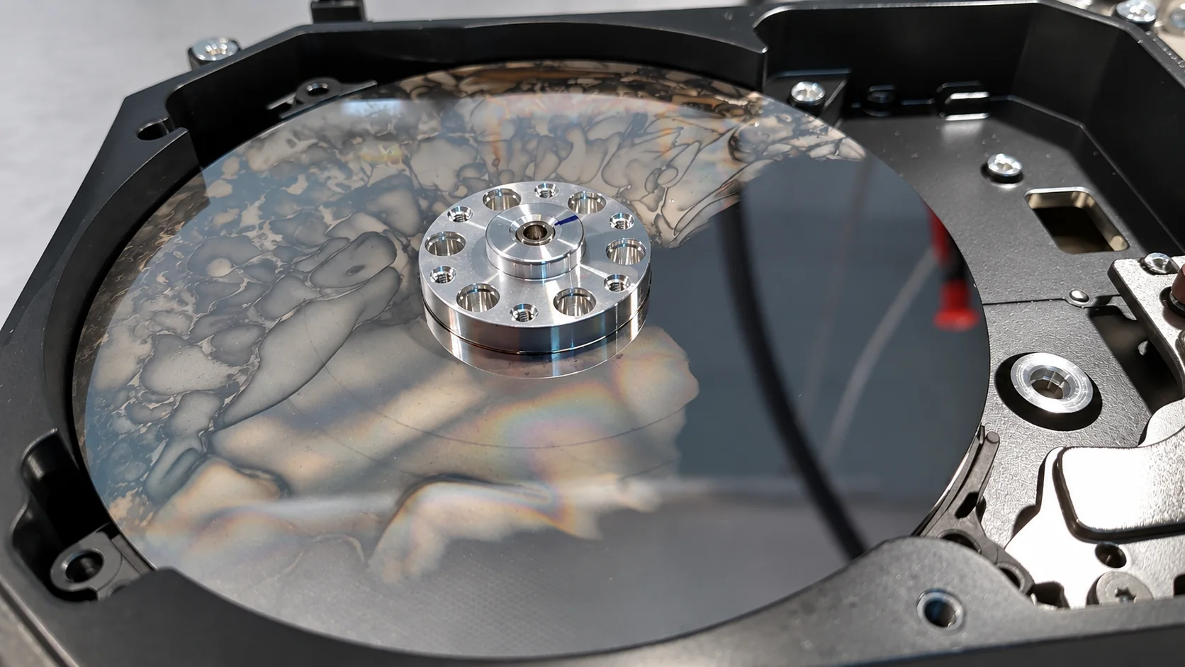 Platter surface from an actual 10 TB Western Digital Purple surveillance hard drive examined after fire exposure