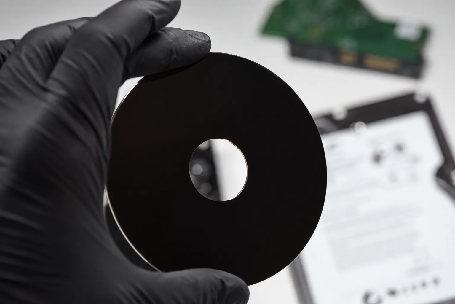 Hard drive recording surface being inspected with clean handling during Seagate data recovery