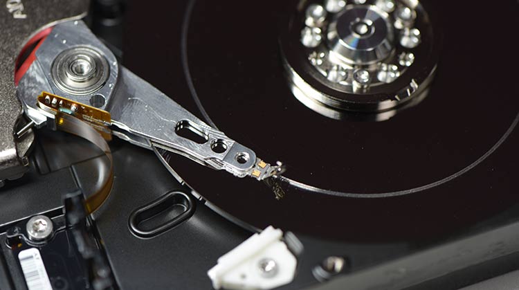 Scratched hard drive platter with rotational scoring