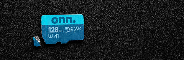 Broken microSD card undergoing data recovery evaluation