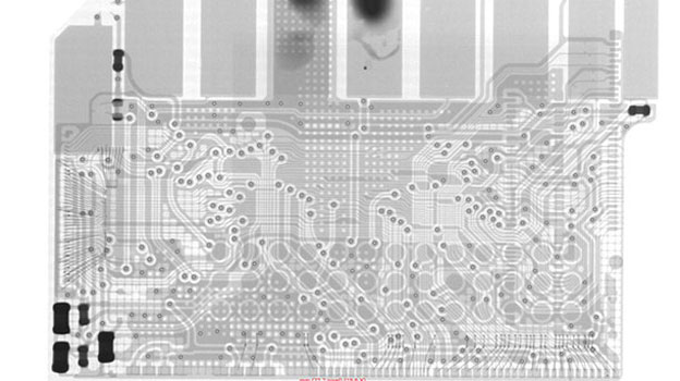 X-ray image showing the internal circuitry and traces of a monolithic SD card during data recovery diagnostics