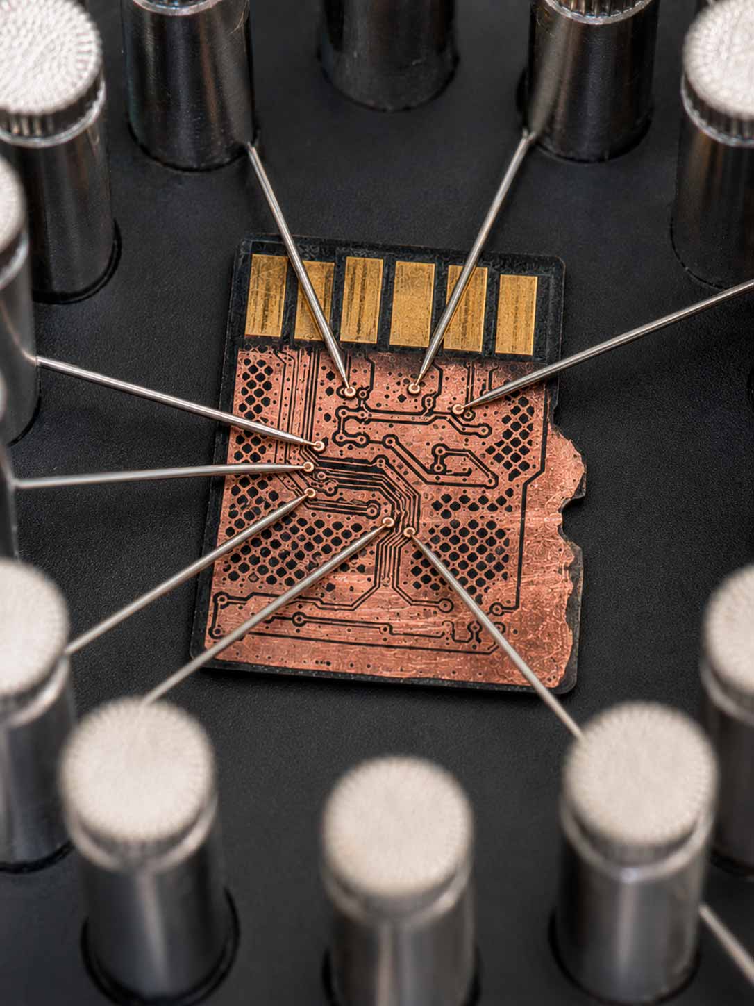 PC-3000 Spider Board probes connected to exposed microSD monolith pinout contacts