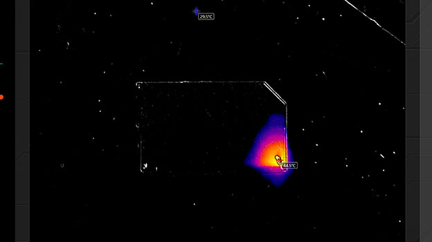 Thermal camera showing a hotspot on a monolithic SD card during data recovery diagnostics